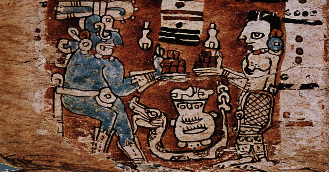 an old piece of art from the Mayan or Incan traditions showing two human like figures holding out plates with brown cubes of whats thought to be cacao