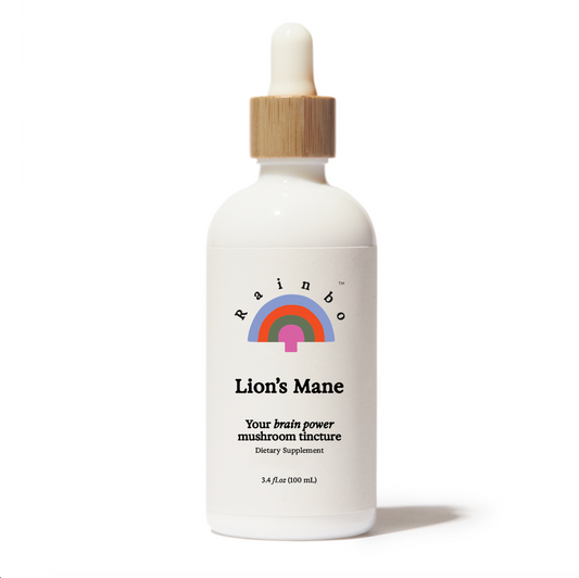 A white bottle with a dropper containing Lion's Mane mushroom tincture, labeled with the Rainbo brand logo and product name.